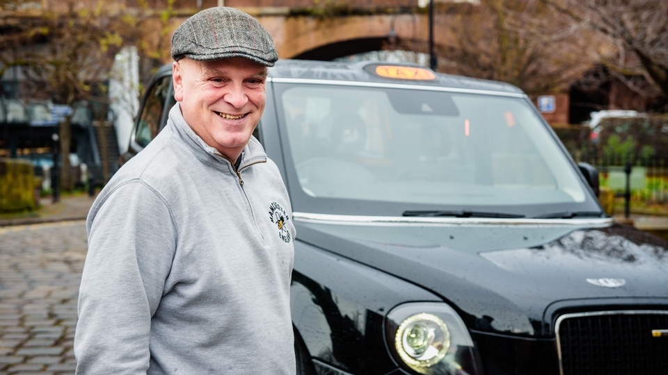 John Consterdine gives tours of Greater Manchester from the comfort of his electric taxi John Consterdine gives tours of Greater Manchester from the comfort of his electric taxi