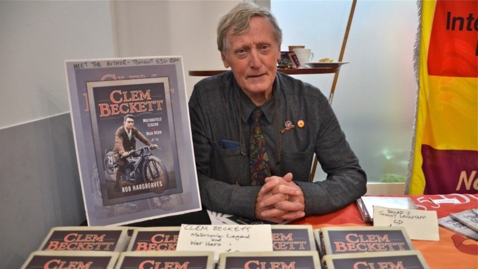 Author Rob Hargreaves with his book about Oldham's Clem Beckett