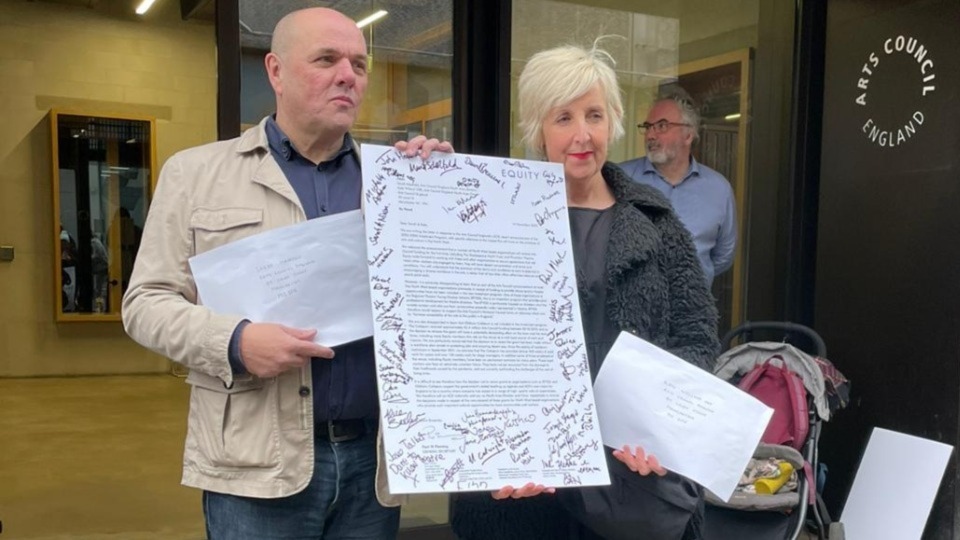 Manchester Equity's North West Official Paul Liversey with actress Julie Hesmondhalgh outside the Arts Council England’s office