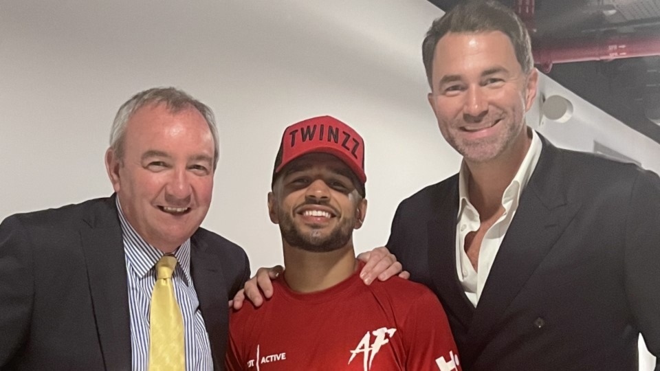 Oldham's Aqib Fiaz is pictured with manager Steve Wood and promoter Eddie Hearn