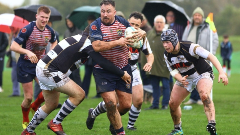 Oldham's Stuart Brennan in the thick of the action