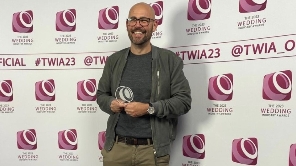 James Tracey is pictured with his award