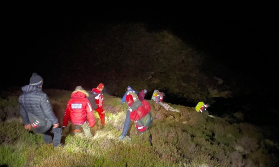 Members of Oldham Mountain Rescue Team in action 