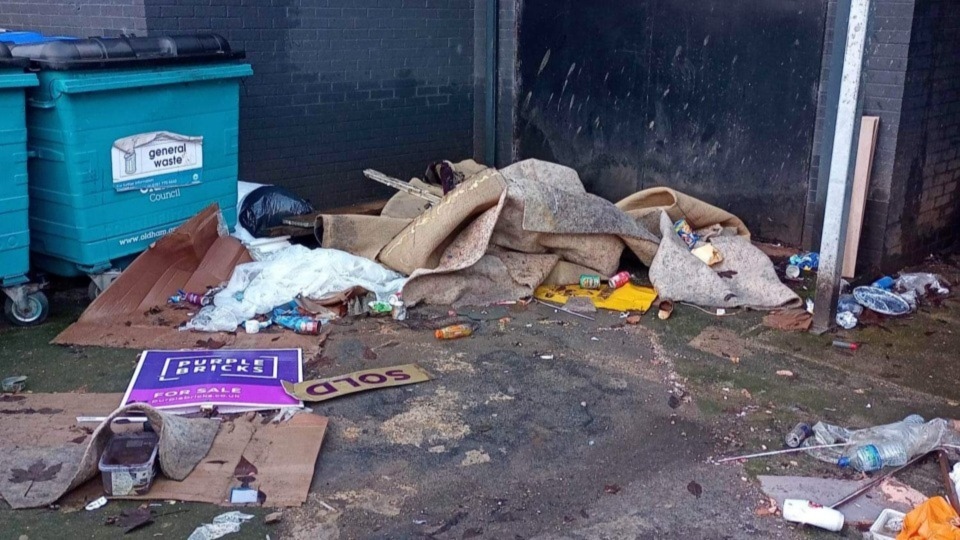 Litter dumped at the rear of Yorkshire Street in Oldham town centre Litter dumped at the rear of Yorkshire Street in Oldham town centre