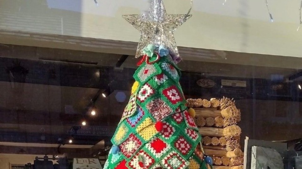 More than 20 industrious team members created over 600 granny squares to make the tree