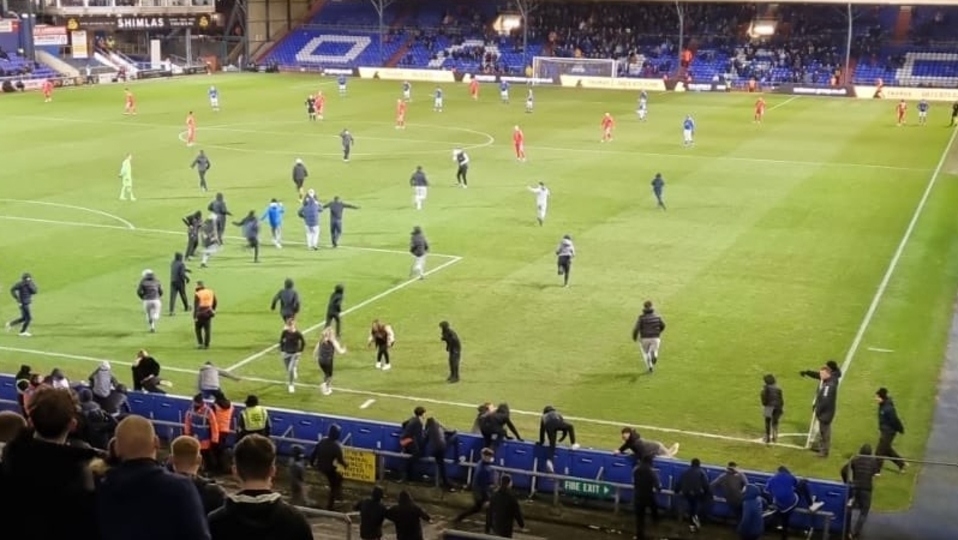 Oldham Athletic fans protest against the club's owners. 