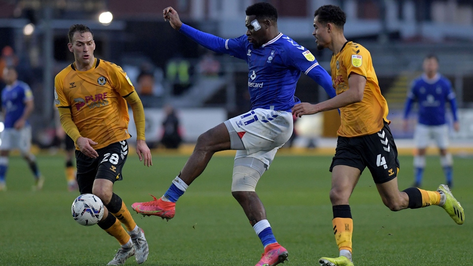 Mike Fondop with Mickey Demetriou and Josh Pask of Newport County