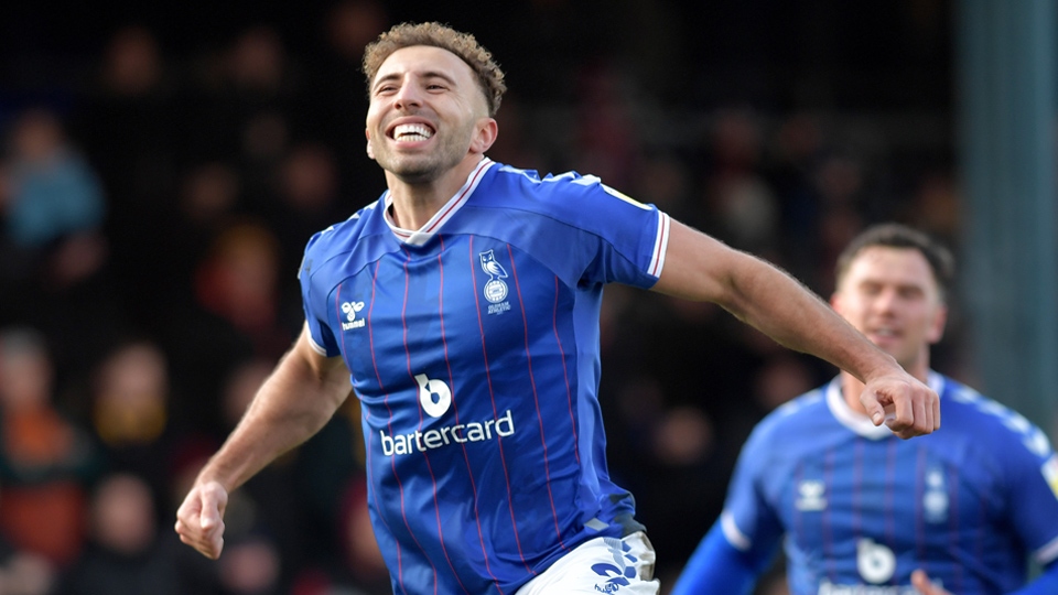 Hallam Hope celebrates scoring Latics' first goal of the game Hallam Hope celebrates scoring Latics' first goal of the game