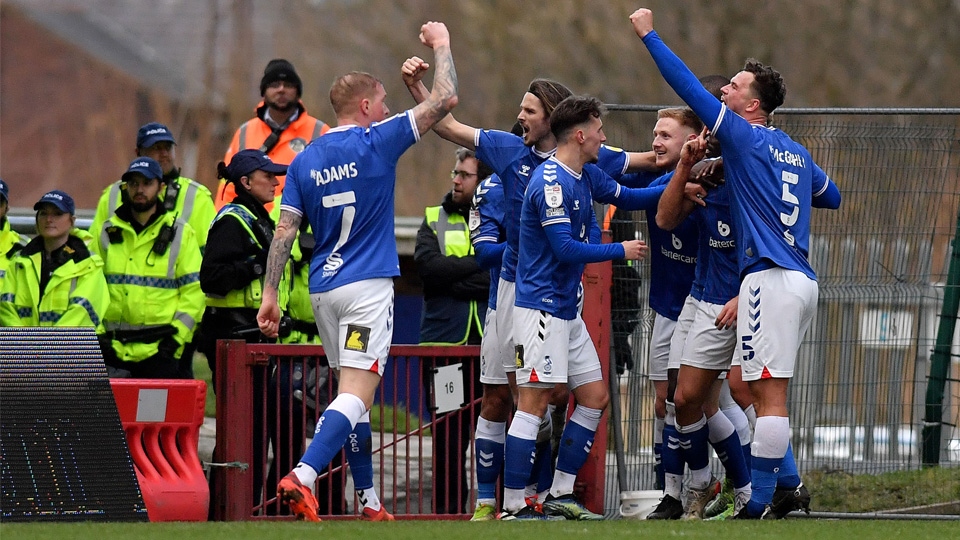 Hallam Hope celebrates scoring Latics' first goal of the game Hallam Hope celebrates scoring Latics' first goal of the game