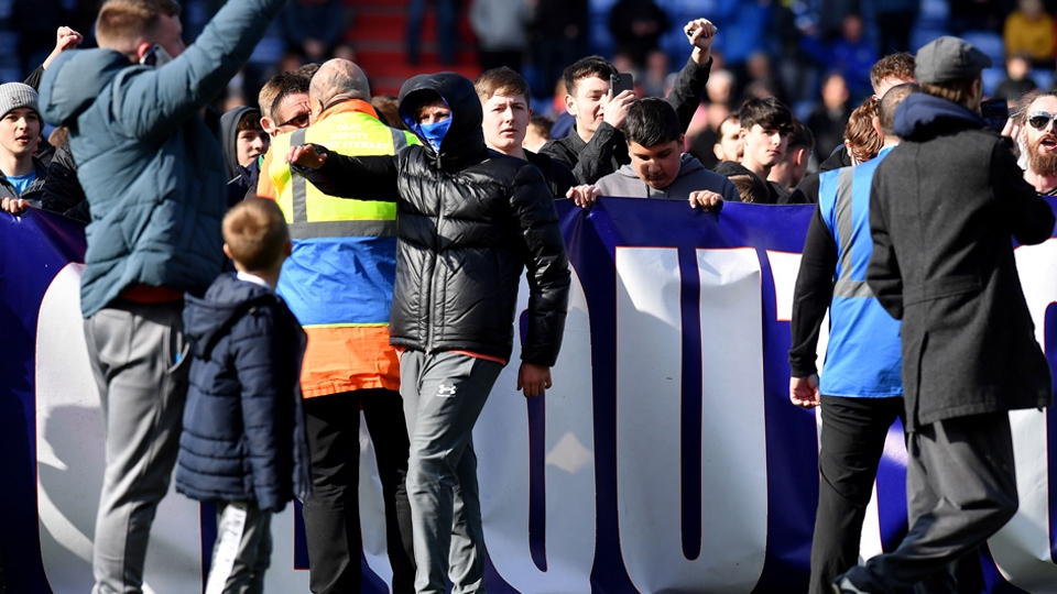 Flashback to when fans invaded the Boundary Park pitch during the Salford City defeat, a result which condemned Latics to relegation from the Football League Flashback to when fans invaded the Boundary Park pitch during the Salford City defeat, a result which condemned Latics to relegation from the Football League