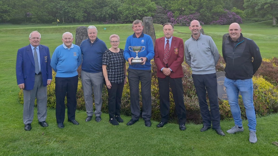 DISTRICT ELITE (from the left) John Barlow (District chairman), Les Lawton, Alan Squires, Linda Newman (Saddleworth Lady Captain), Mark Riley, Dave Newman (Saddleworth captain), Gary Melling.