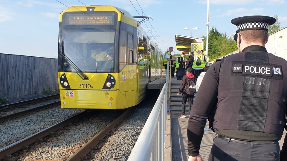 Officers at Freehold tram stop yesterday