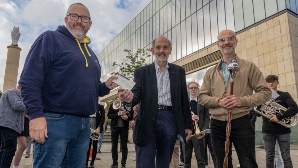 Pictured (left to right) are: Mike Butterworth, Chair of the Families and Friends of Oldham Music Centre, Ian Brett, President, Saddleworth Rotary Club, and Jonathan Leedale, Deputy Head of the Oldham Music Service and Director of the Tour