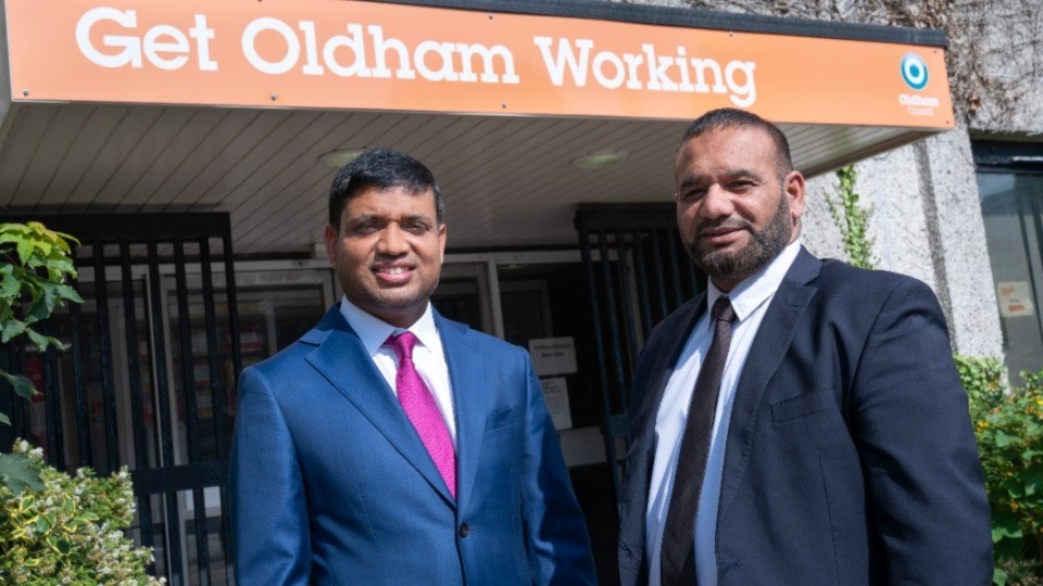 Cllr Mohon Ali (left) and Cllr Shoab Akhtar are pictured outside the Get Oldham Working HQ