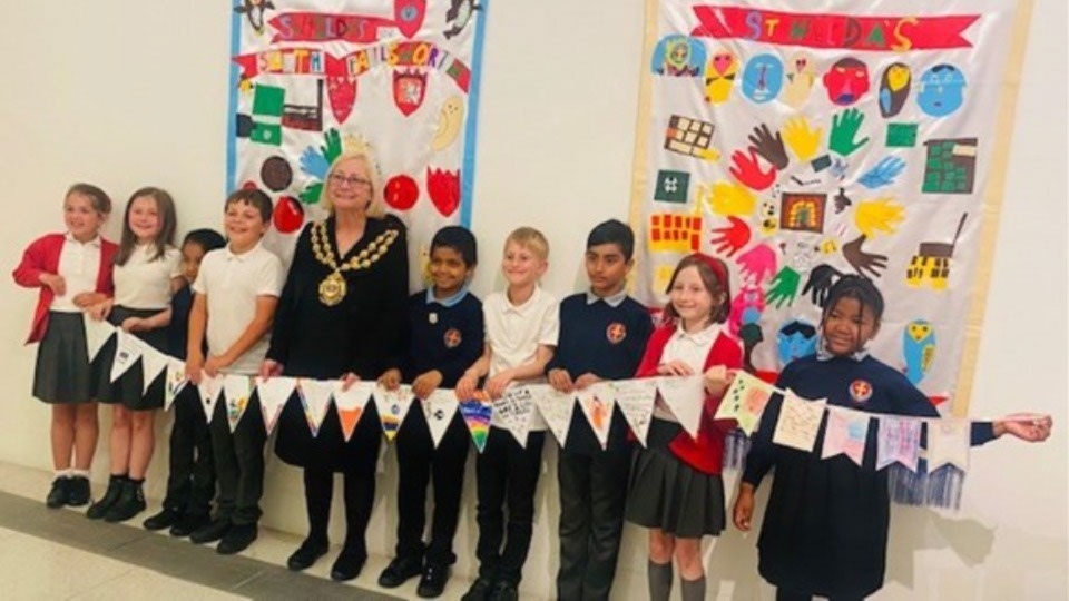 The Mayor of Oldham is pictured with pupils as part of linking celebrations