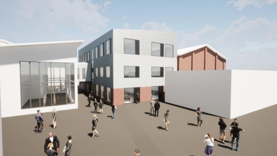 The proposed extension to Ashton Sixth Form College next to the sports hall. Image courtesy of aad architects