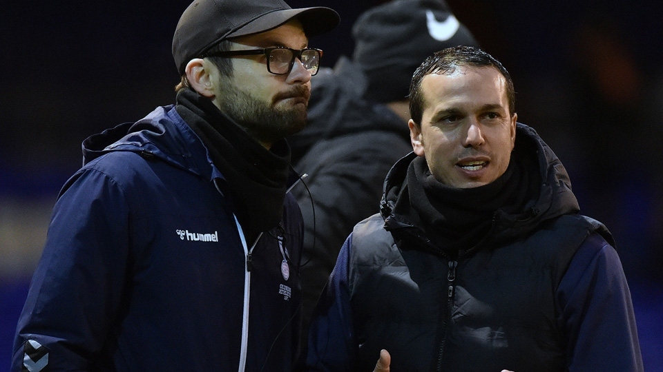 Conor Marlin (left) is pictured with Selim Benachour during his short spell as Latics' caretaker assistant manager last season