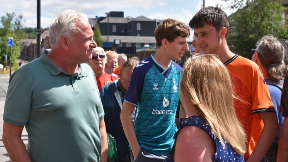 Fans queue outside Boundary Park today. Images courtesy of OAFC