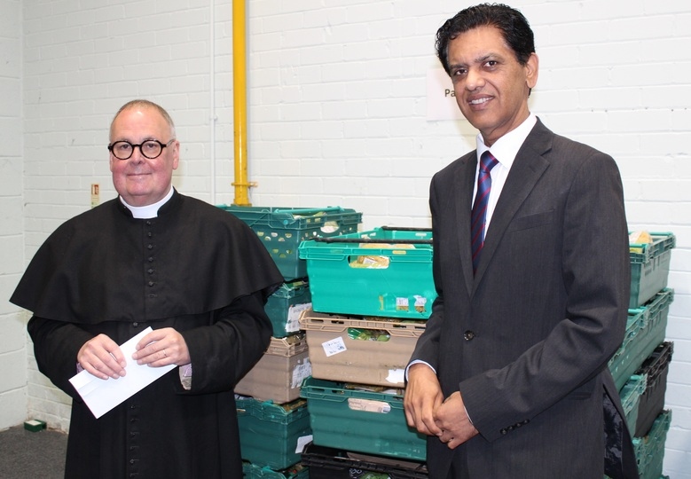 Pictured left to right: Father Tom Davis and Dr Zahid Chauhan OBE