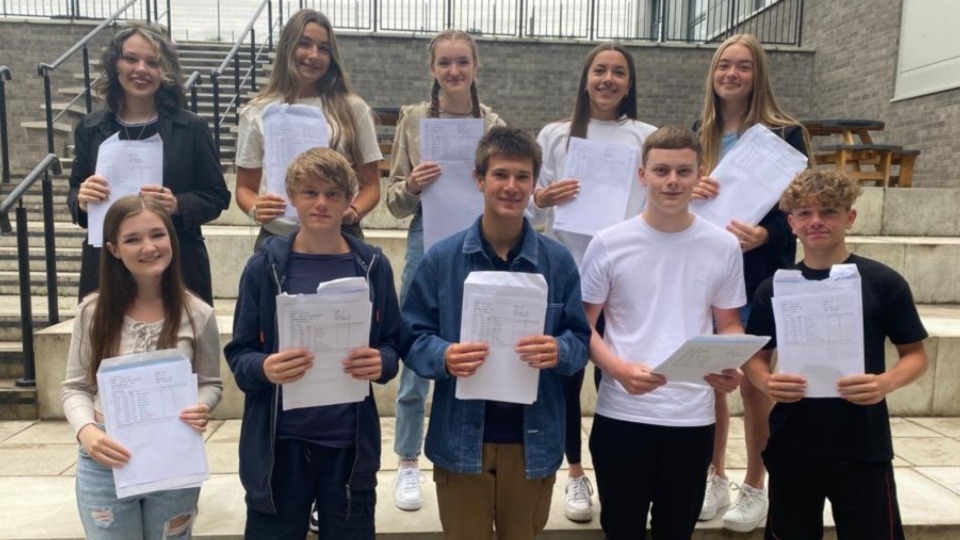 Proud Saddleworth School students show off their GCSE certificates