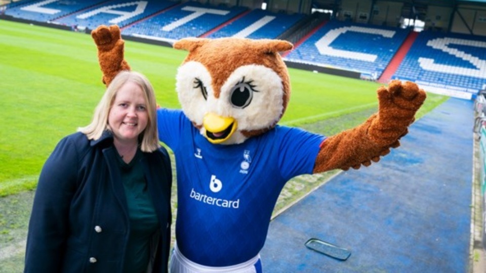 Councillor Amanda Chadderton, Leader of Oldham Council, is pictured with Chaddy the Owl