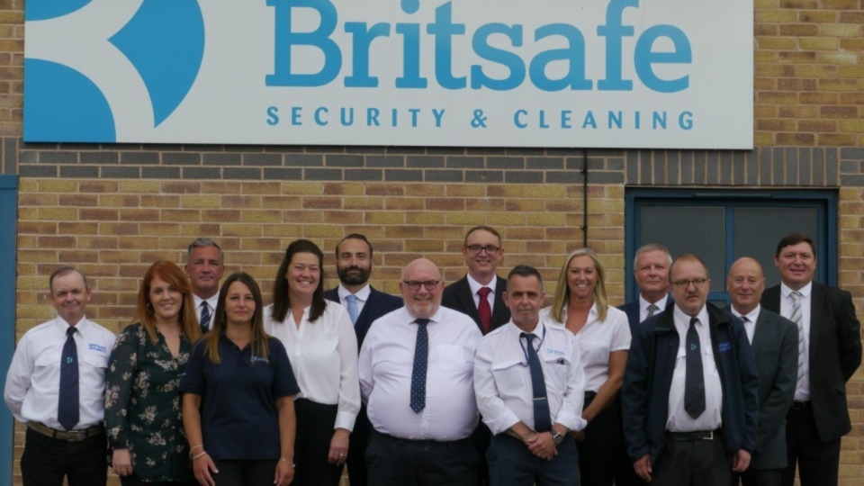 Britsafe employees with managing director Paul Cody (centre front wearing glasses)