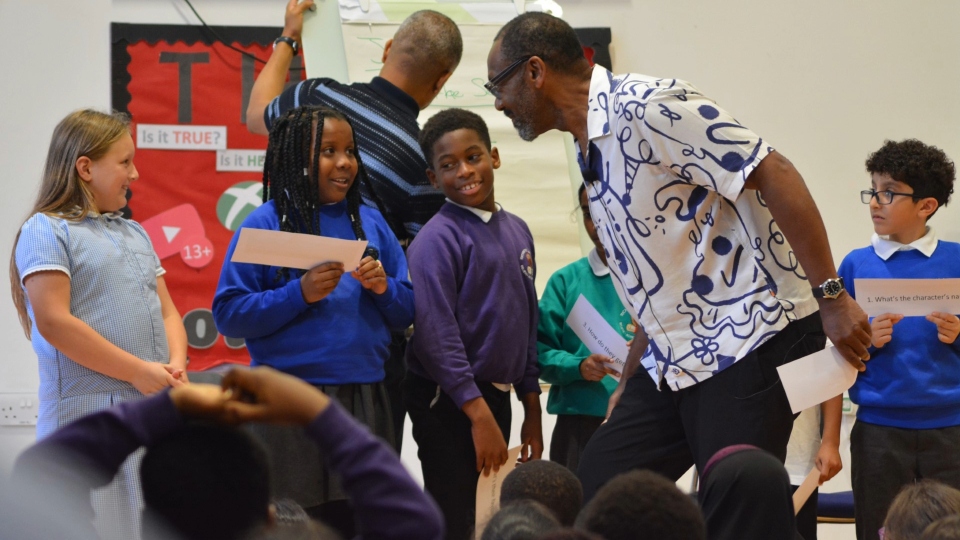 Sir Lenny Henry creating a story with Year 4 children from Oldham