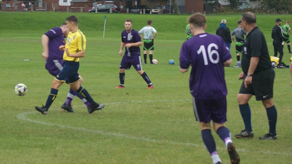 Action from the Division Three clash between Santos and Saddleworth 3D