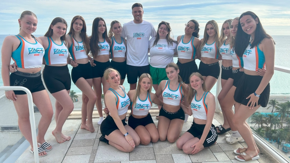 The dancers performed alongside official Dolphins cheerleaders The dancers performed alongside official Dolphins cheerleaders
