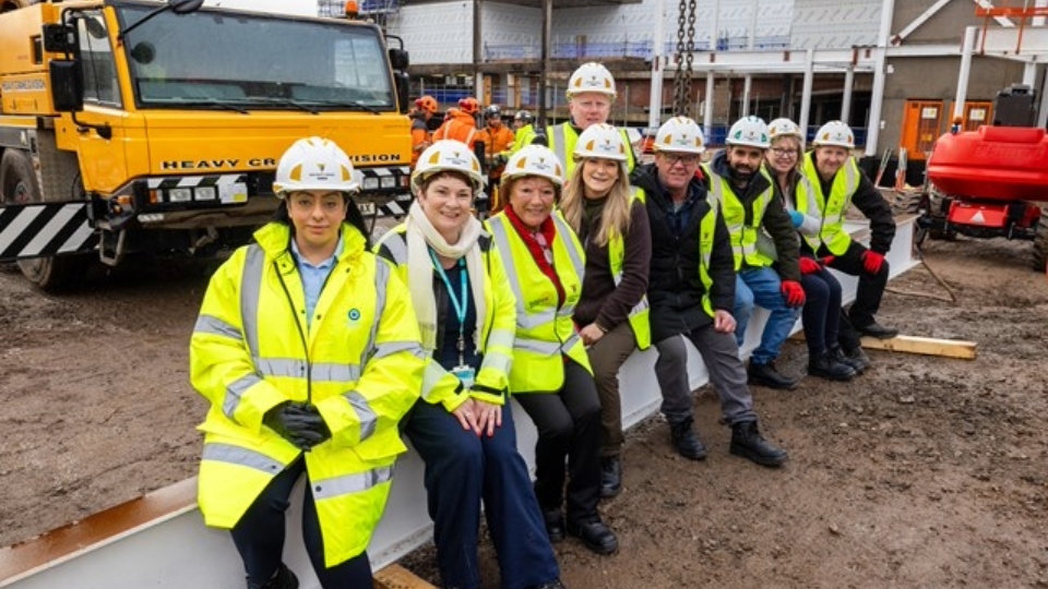 A group of the market traders pictured with Oldham Council Leader, Cllr Arooj Shah, at the new Tommyfield Market site