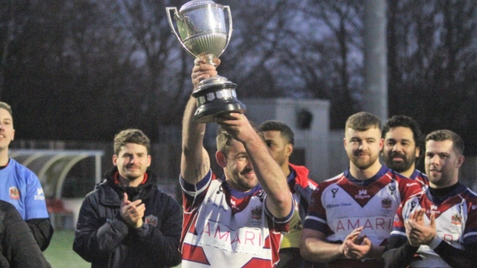 Martyn Ridyard parades the Law Cup silverware