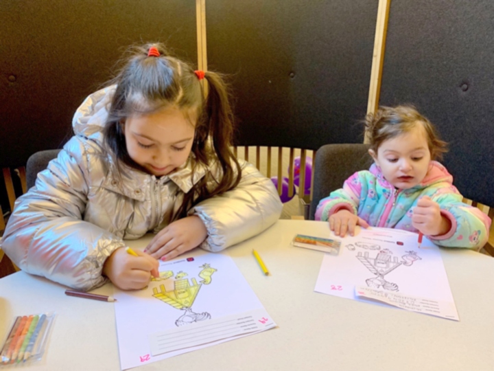 Nella Piroskova and Michaela Minarikova enjoying their colouring at NatWest's Oldham branch. Nella Piroskova and Michaela Minarikova enjoying their colouring at NatWest's Oldham branch.