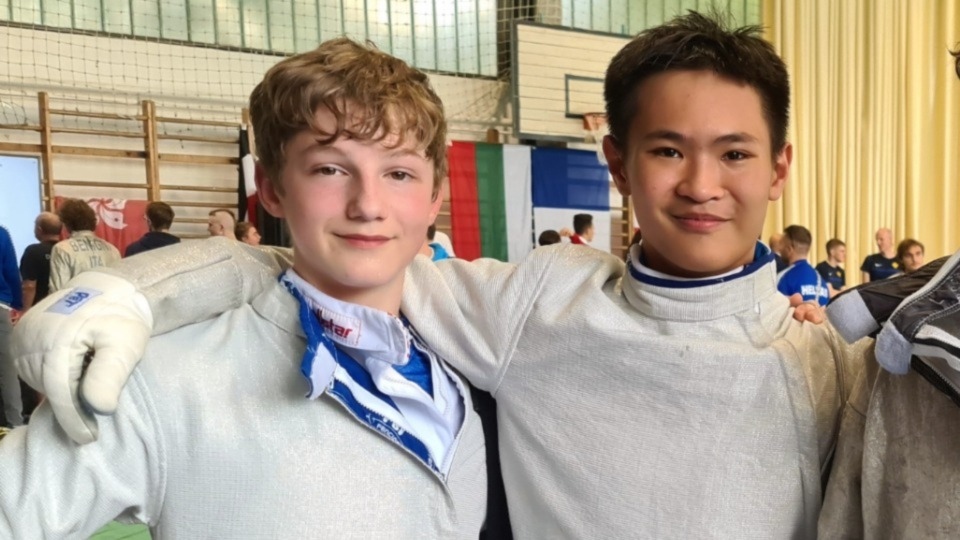 Alex Lister, who trains at the TMFC Fencing club in Oldham, is pictured above (left)