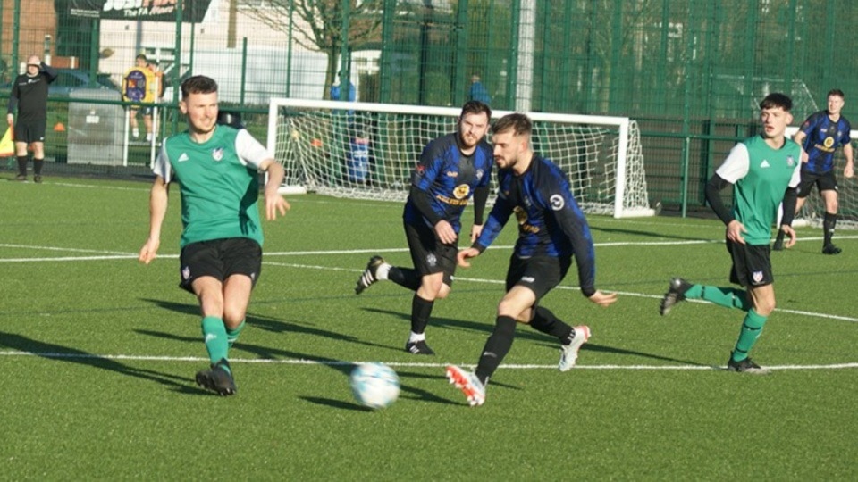Action from the top flight clash between Salford Vics (green shirts) and local side Shaw Athletic Action from the top flight clash between Salford Vics (green shirts) and local side Shaw Athletic