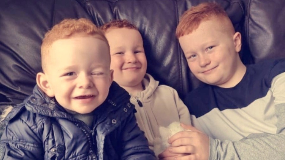 Freddie is pictured (left) with Braydn and Archie