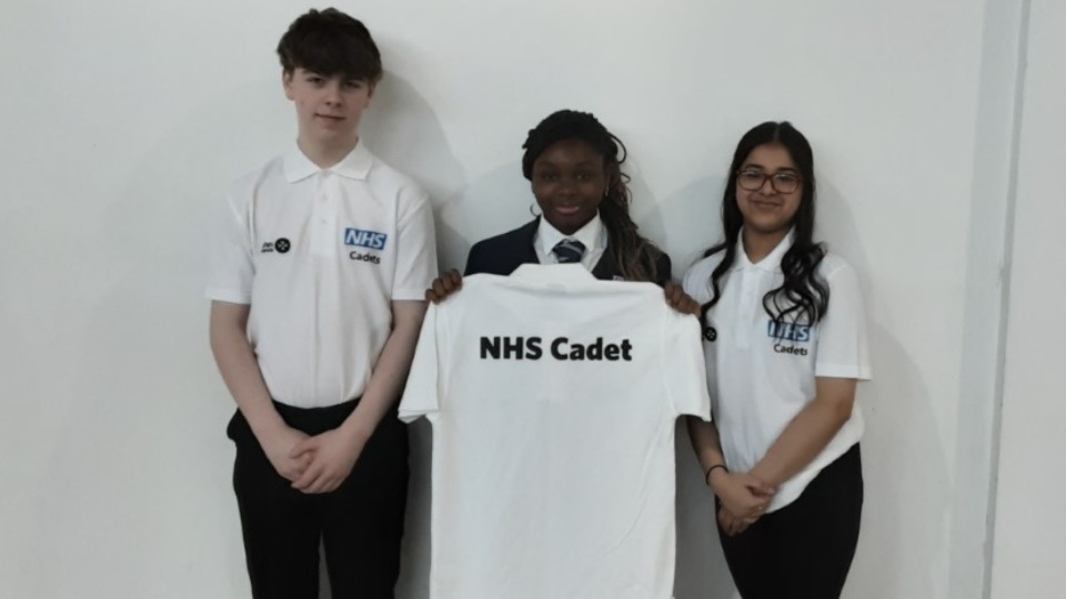 NHS Cadet course students Muntaha, Amezhi and Kai