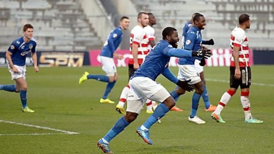George Elokobi celebrates scoring a goal during his spell as a Latics player George Elokobi celebrates scoring a goal during his spell as a Latics player