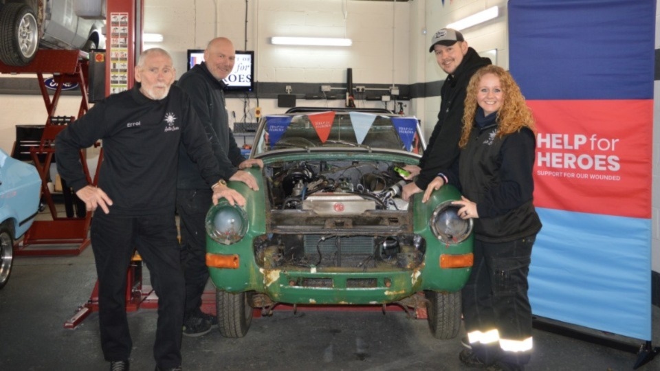 Jody Bevan is pictured with the Auto Lass team