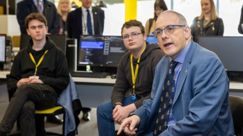 Robert Halfon, Minister of State for Education, hears from T Level Digital learners about why they prefer this vocational route to a career in the Agile Labs at Oldham College’s Digital and Creative Centre