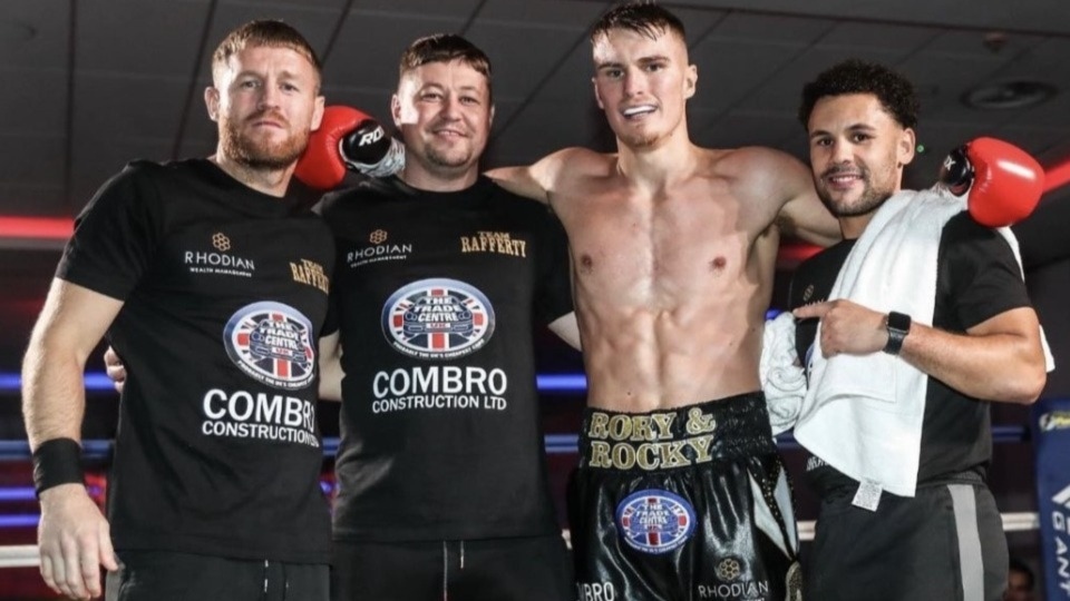 Pictured with Shaw boxer Tom Rafferty (second right) are his coaching team, (from left) ex-world champion Terry Flanagan, Steve Maylett and Joe Eko