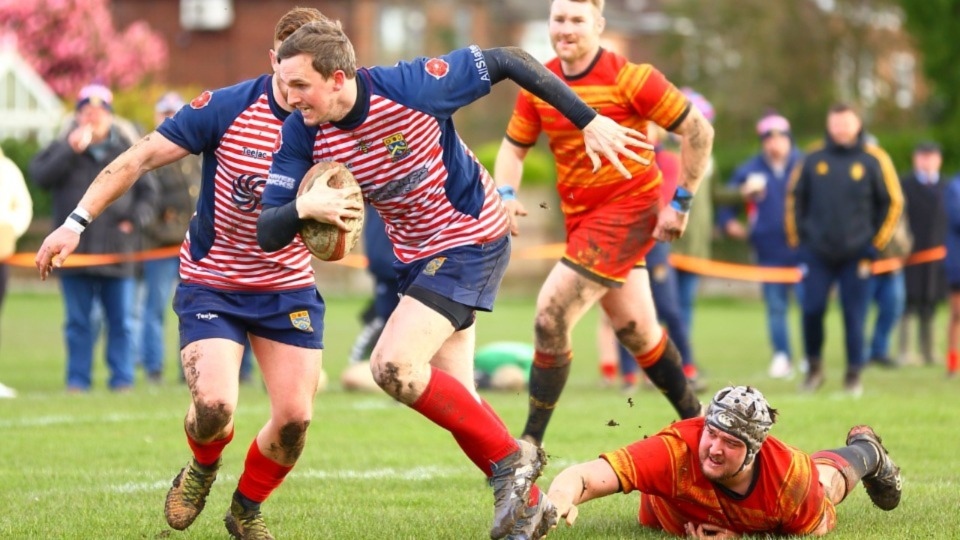 Oldham's Tom Davies leaves an opponent trailing in his wake