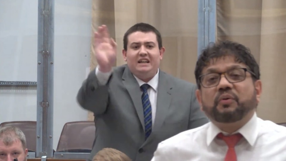 Councillors Lewis Quigg and Abdul Jabbar at the Oldham council budget meeting