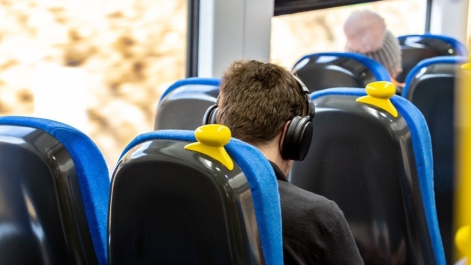 A commuter on a Northern train service