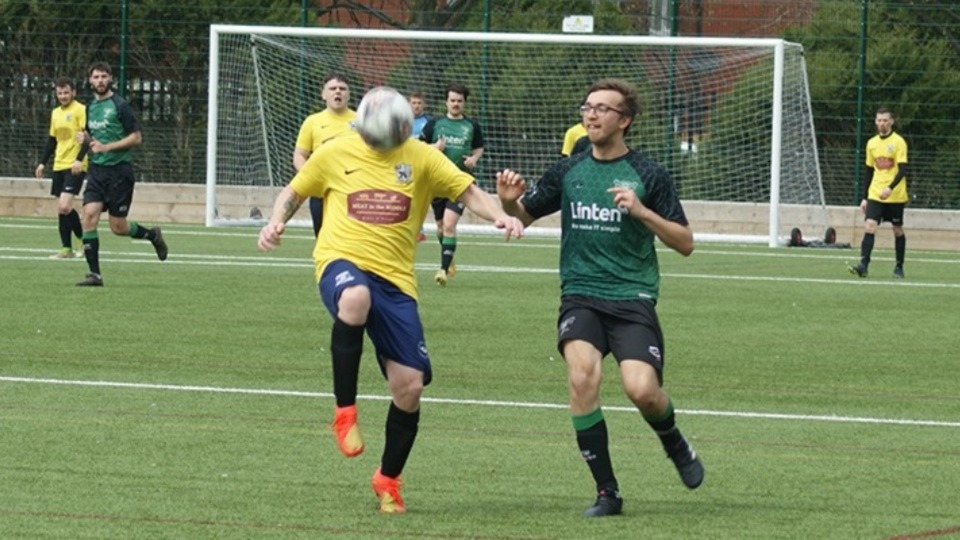 HEAD THE BALL: Action from the game between Oldham Saints and Village Manchester reserves. Village won 6-2, but Saints recovered well from a 5-1 interval deficit
