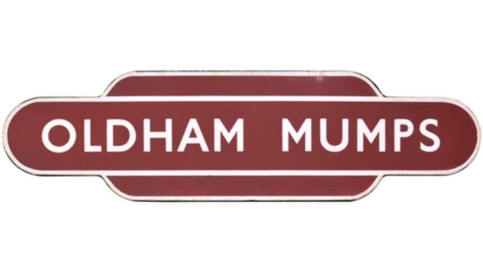 The totem sign, with 'Oldham Mumps' written on it, which is set to go up for auction The totem sign, with 'Oldham Mumps' written on it, which is set to go up for auction