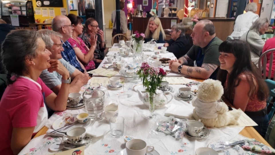 Volunteers enjoy afternoon tea at Emmaus Mossley