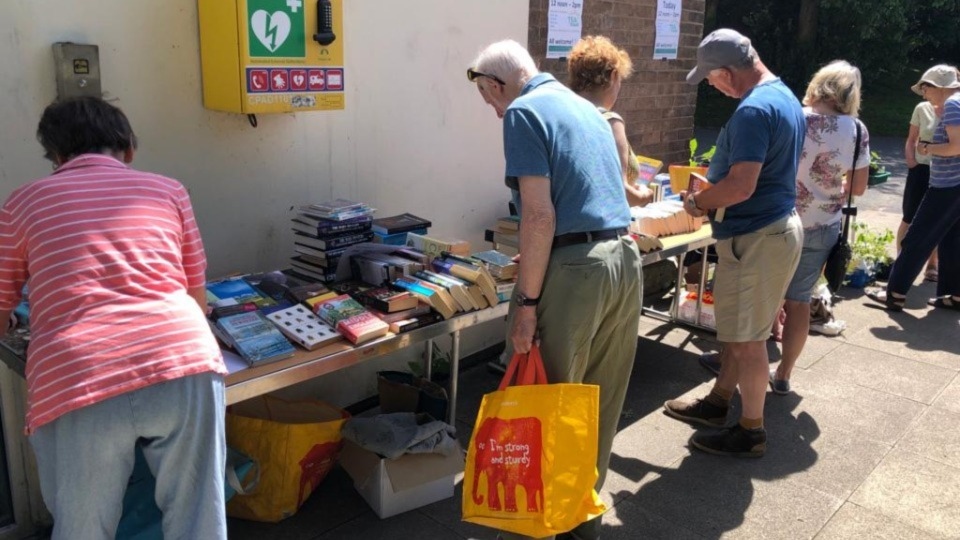 Bookstall browsers at last year's Tea for Trussell event