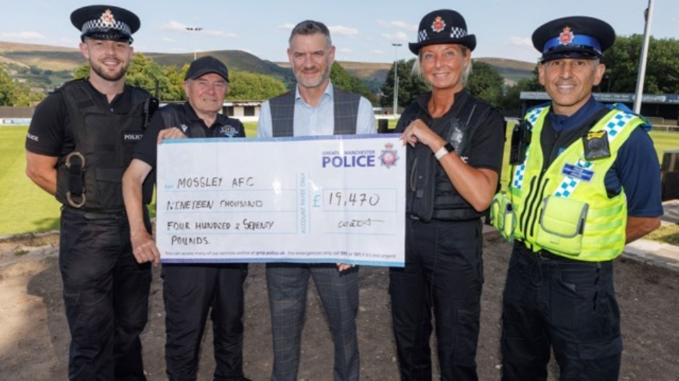 Mossley FC received a cheque for £19,470