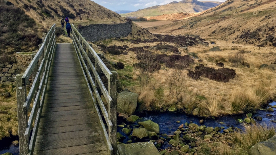 A footbridge over Chew Brook