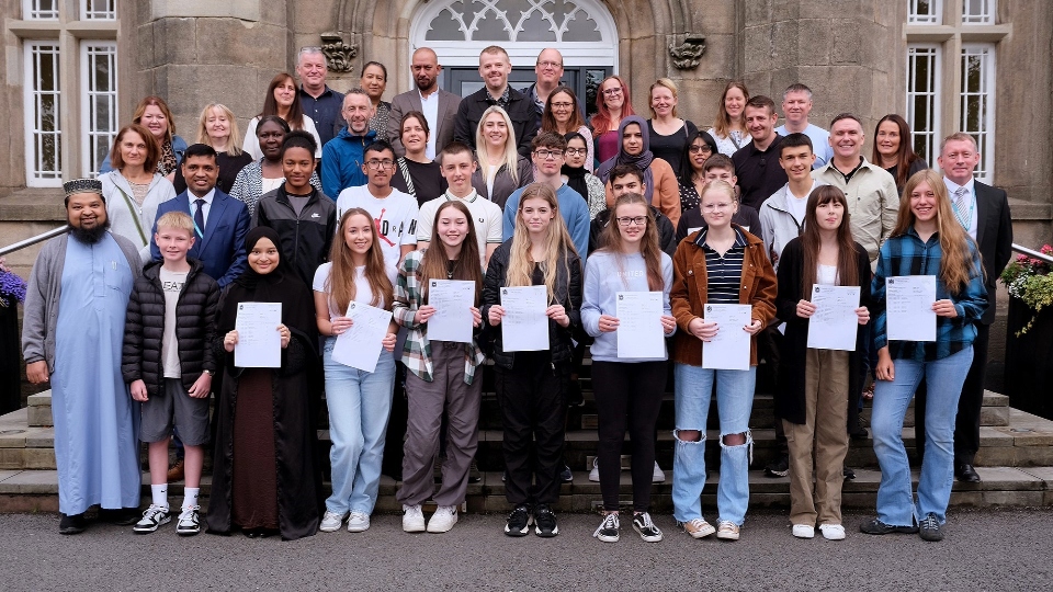 What a celebration: Blue Coat pupils celebrate their GCSE results earlier today